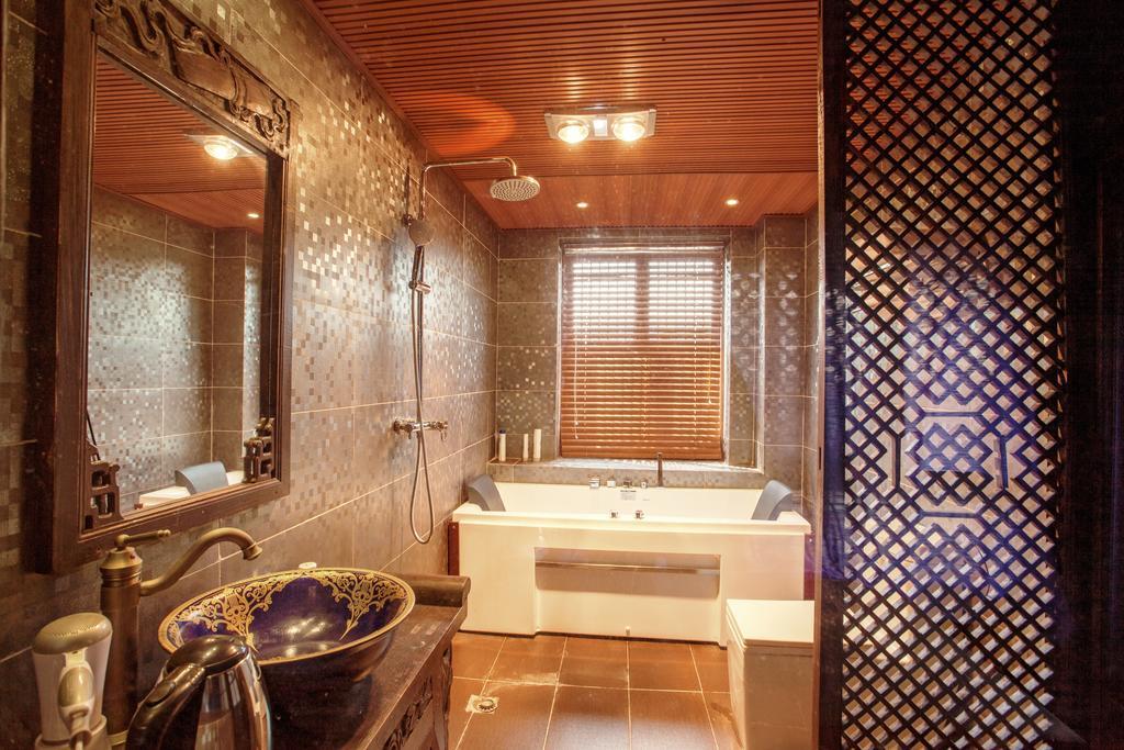 シー タン エクスクイジット ホテル 麗江市 部屋 写真